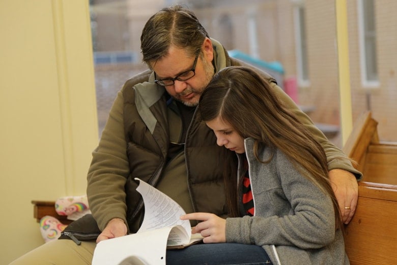 Intercessory prayer volunteers at Madison First United Methodist Church pray one hour each week for those in need. Photo courtesy of Bob Dickson and his daughter Rachel.